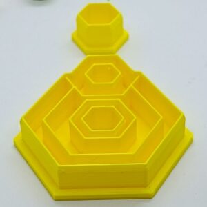 Geometric Gradation: Nested Yellow Hexagons