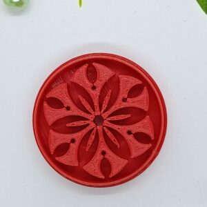 Floral Elegance in Crimson: Artistic Carving on a Disc (Small)