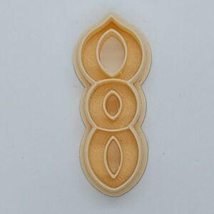 A Trio of Golden Ovals Clay Cutter