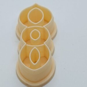 A Trio of Golden Ovals Clay Cutter