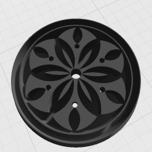 Floral Elegance in Crimson: Artistic Carving on a Disc
